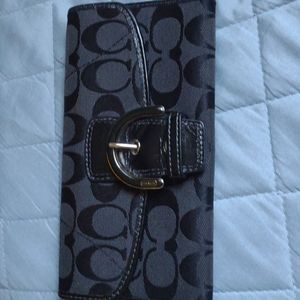 Coach signature wallet.